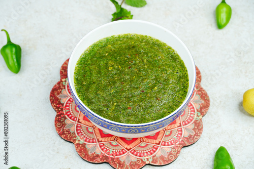 Mint and Green Chilli Sauce, Made with Tamarind Mint Coriander and Spices. Podina Chatni photo