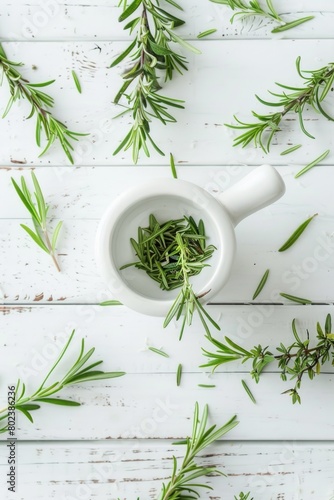 Fresh herbs in a white mortar on a rustic wooden table. Perfect for culinary or alternative medicine concepts