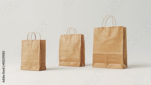 Three brown paper bags sitting next to each other. Can be used for various shopping or eco-friendly concepts