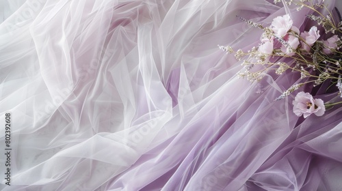 Gauzy tulle in a soft lavender shade creates a romantic and airy textured backdrop.