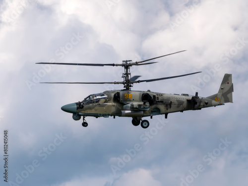 ZHUKOVSKY, RUSSIA - 25 July 2021: Demonstration of the Kamov Ka-52 Alligator attack helicopter of the Russian Air Force at MAKS-2021, Russia photo