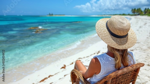 Woman relaxing in wicker hammock, enjoying the sun on a peaceful beach vacation getaway