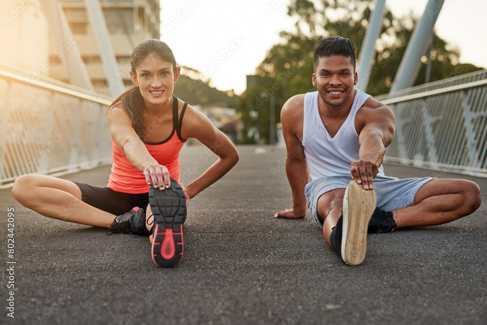 © peopleimages.com - Fitness, portrait and couple stretch on bridge for health, wellness or warmup for run. Man, woman and training on road for cardio, preparation and workout together in city for marathon, jog or sprint © peopleimages.com - Fitness, portrait and couple stretch on bridge for health, wellness or warmup for run. Man, woman and training on road for cardio, preparation and workout together in city for marathon, jog or sprint