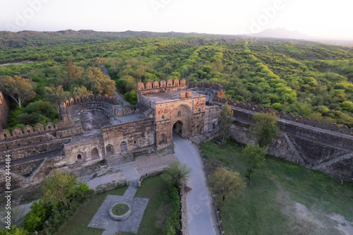Aerial view of ruins of Rohtas fort Pakistan, The main gate outpost and watch tower on green hill. © CaterpillarTaqi