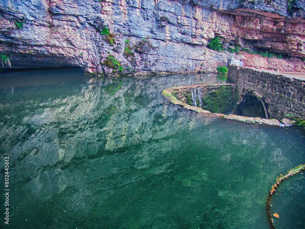 Waterfall and pond at the entrance of Trabzon Cal Cave