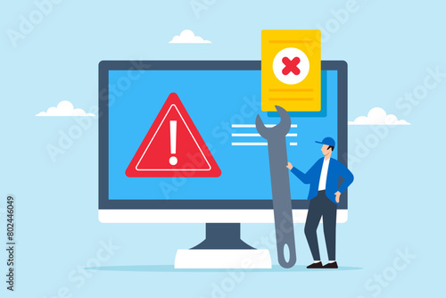 Technician holding wrench while fix system failure or errors message on computer. Concept of software problems, hardware faults, caution and maintenance to resolve security alerts