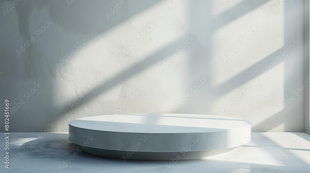 Contemporary empty round podium stand with a matte finish, positioned in a bright studio setting to emphasize product features