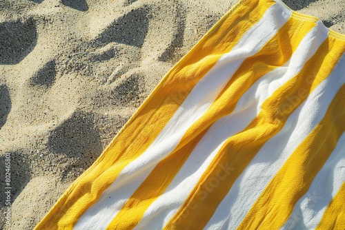 Flat lay of fabric towel on beach sand