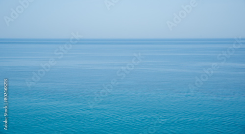 Fototapeta Naklejka Na Ścianę i Meble -  Still calm sea or ocean blue water surface background