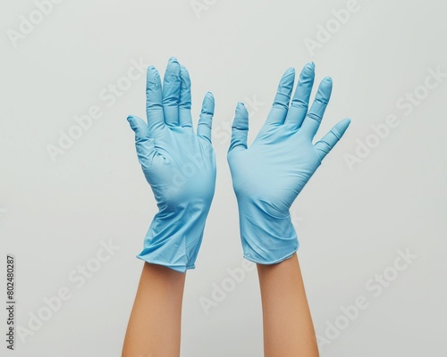 Nitrile Glove Concept. Blue Surgical Gloves for Clean Clinical Care Isolated on White Background photo