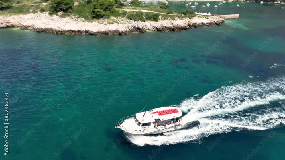 Drone shot of a ferry heading to Dubrovnik, Croatia. Drone shot of a ferry heading to Dubrovnik, Croatia.