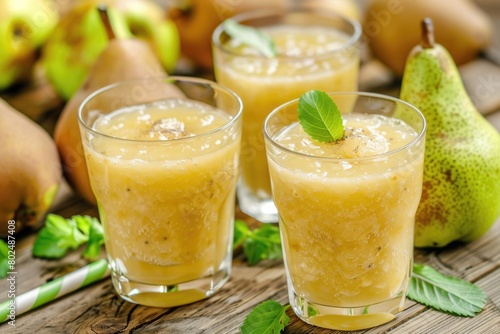 Fresh and Healthy Pear Smoothie in Green Glasses - Delicious Fruit Beverage