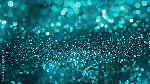 Abstract sparkling turquoise glitter background ideal for festive designs and elegant backdrops. 