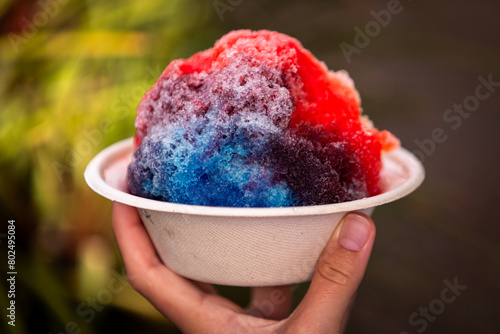 Shave ice - hawaiian shaved ice dessert. Close up of traditional local Hawaii dessert food. photo