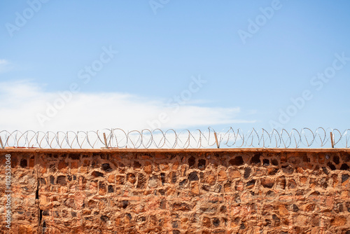 Concertina razor wire fence defense