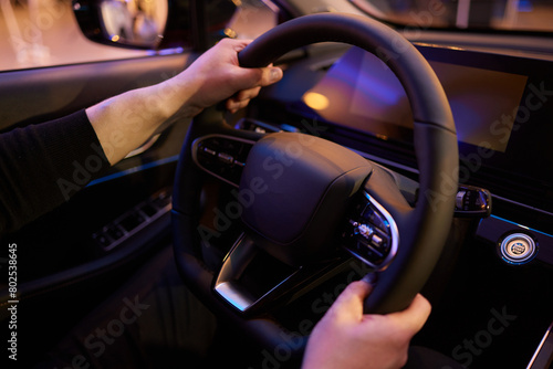 Hand of woman holding steering wheel of car © Евгений Вершинин
