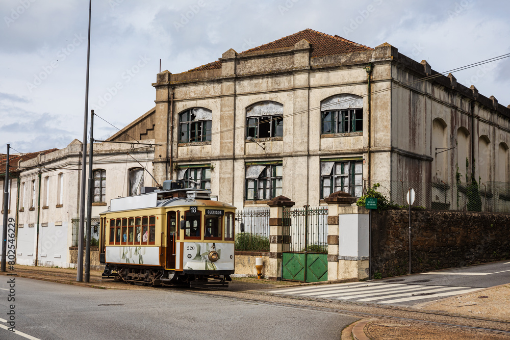 Naklejka premium old street in the old town with an old tranvia
