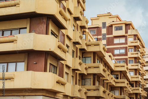 building with balconies making square forms (ID: 802546225)