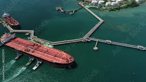 Aerial view of cargo ship on Water Terminal Madre de Deus, intended for receiving oil and shipping petroleum derivatives processed by the Mataripe Refinery. - Madre de Deus, Bahia, Brazil  photo