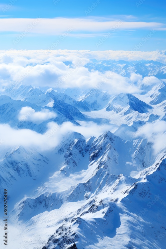 Breathtaking aerial view of snow-capped mountain peaks