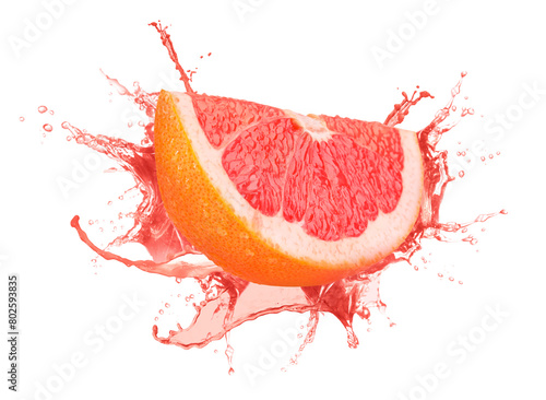 Fresh grapefruit with splashing juice on white background