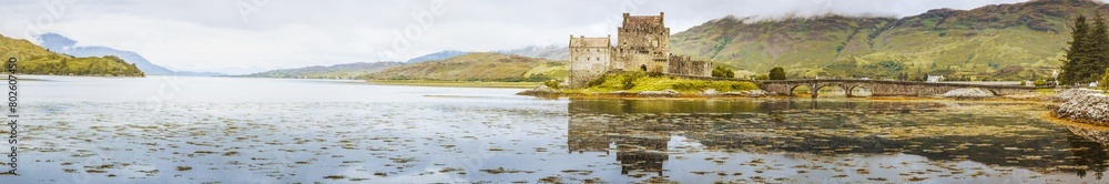 A beautiful panoramic view of Eilean Donan Castle in Scotland. A beautiful panoramic view of Eilean Donan Castle in Scotland.