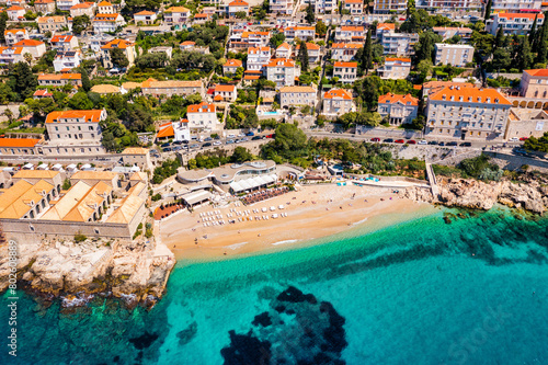 Beautiful beach Banje and Dubrovnik touristic destination, Croatia. Banje beach in Dubrovnik aerial view, Dalmatia region of Croatia. photo