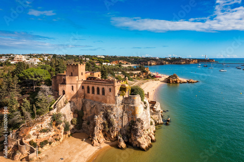 The Fort of Sao Joao do Arade (Castle of Arade) in Ferragudo Village, Algarve. Beach and castle Sao Joao do Arade in Ferragudo in the Algarve in Portugal.