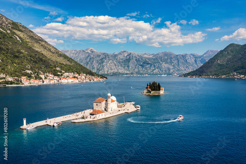Saint George Island and Church of Our Lady of the Rocks in Perast, Montenegro. Our Lady of the Rock island and Church in Perast on shore of Boka Kotor bay (Boka Kotorska), Montenegro, Europe. photo