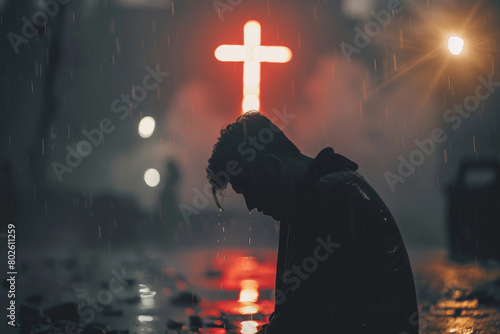 Man, god and rain with depressed for mercy with plead or cry for help with test of faith with glow cross. Mental health, doubt or loss with grief, hopeless and trouble with spiritual crisis outside. photo
