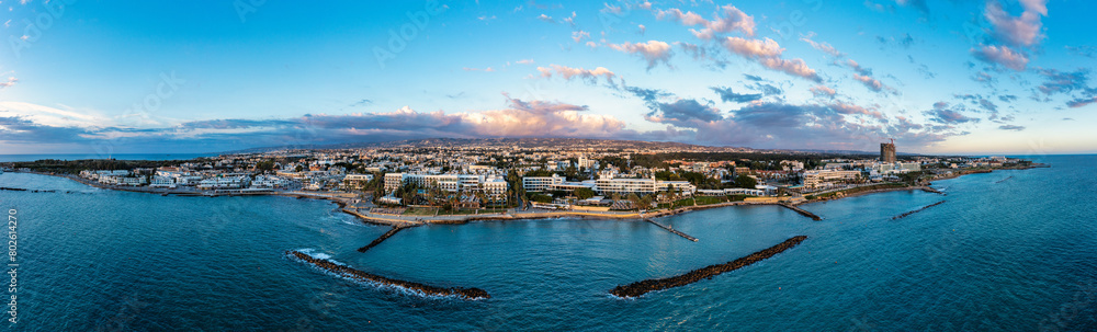 View of the town of Paphos in Cyprus. Paphos is known as the center of ancient history and culture of the island. View of embankment at Paphos Harbour, Cyprus. View of the town of Paphos in Cyprus. Paphos is known as the center of ancient history and culture of the island. View of embankment at Paphos Harbour, Cyprus.