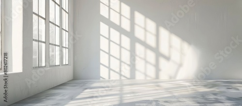 White studio background designed for product presentation  set in an empty gray room with window shadows and a blurred backdrop for showcasing products.