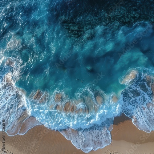 The object seen above the coastline is sparkling exotically from above, captured by a stunning drone camera, complete with the beauty of clear sea water and coral rocks