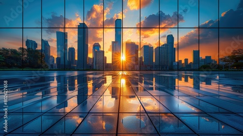 Cityscape with skyscrapers and sunset reflecting on the glass floor