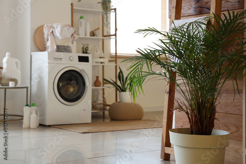 Modern home laundry room in...