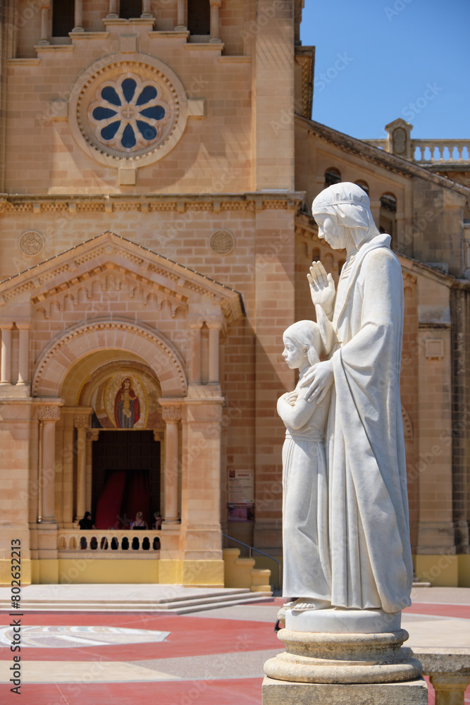 Marble statue of Mother and Child in front of the Basilica of the National Shrine of the Blessed Virgin of Ta' Pinu - Gharb, Malta
