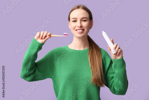 Young woman with tooth brus...