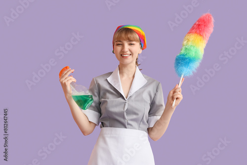 Young chambermaid in rainbo...