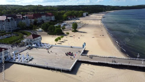 Aerial View Of A Public Square With Long Wooden Pier In Sopot Beach On The Gdańsk Bay, Poland. photo