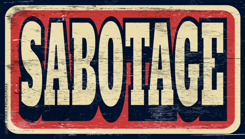 Aged and worn sabotage sign on wood