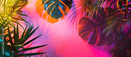 Concept art featuring vibrant holographic neon colors on tropical and palm leaves  creating a minimal surreal summer background.