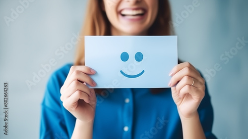 woman holding a smile blank card