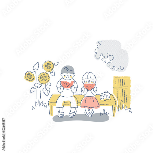 スイカを食べている男の子と女の子