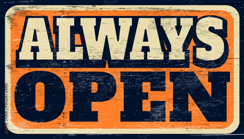 Aged and worn always open sign on wood