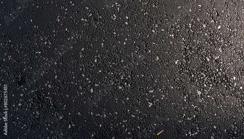 Black small road stone background, dark gravel pebbles stone texture seamless texture photo
