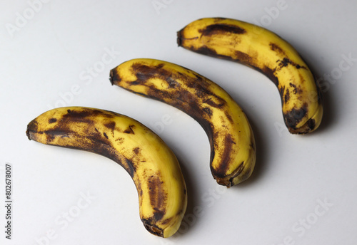 Fotografija Three rotten banana isolated on white background
