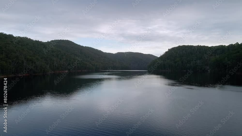 Stunning Lake Barrington aerial view with calm water on cloudy overcast day near Sheffield in Tasmania, Australia Stunning Lake Barrington aerial view with calm water on cloudy overcast day near Sheffield in Tasmania, Australia