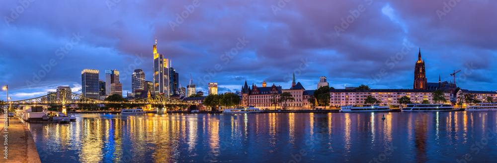Frankfurt Germany, night panorama city skyline at Main River and business skyscraper Frankfurt Germany, night panorama city skyline at Main River and business skyscraper