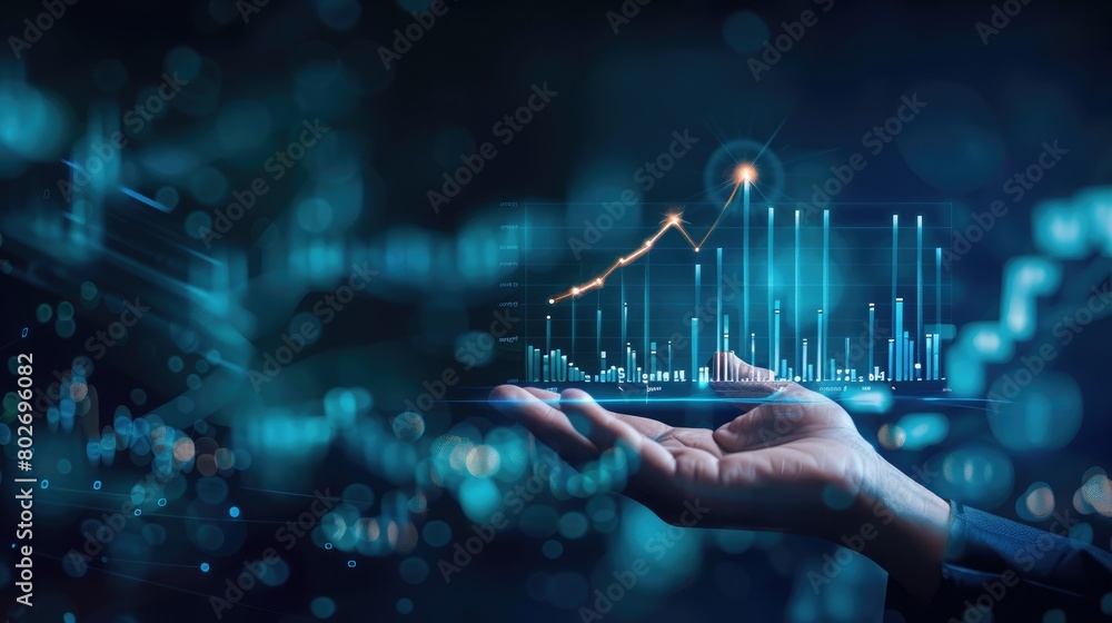 A businessman's hand presents a holographic financial graph in a dark blue environment, symbolizing economic forecasting and market trends A businessman's hand presents a holographic financial graph in a dark blue environment, symbolizing economic forecasting and market trends