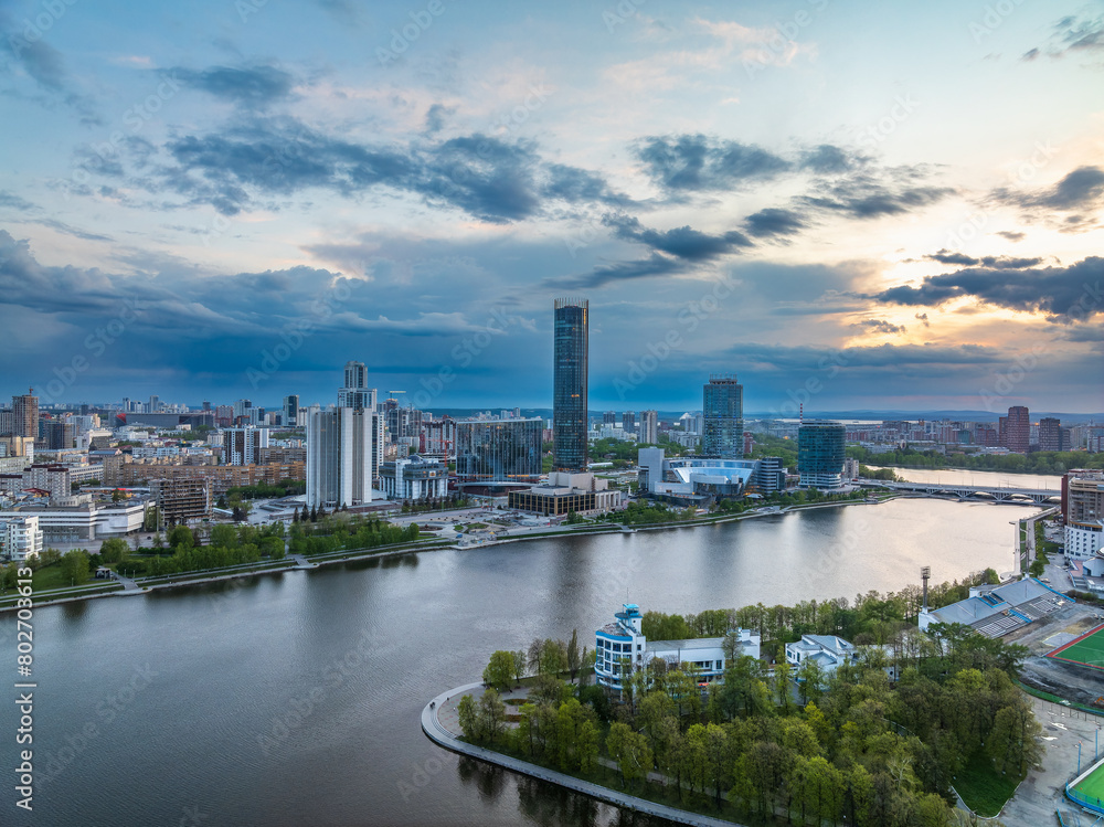 Yekaterinburg city with Buildings of Regional Government and Parliament, Dramatic Theatre, Iset Tower, Yeltsin Center, panoramic view at summer sunset.